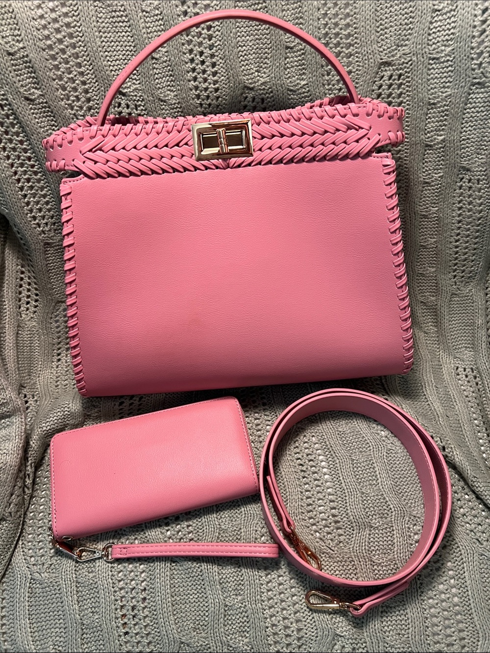 New pink bag with strap and matching wallet.